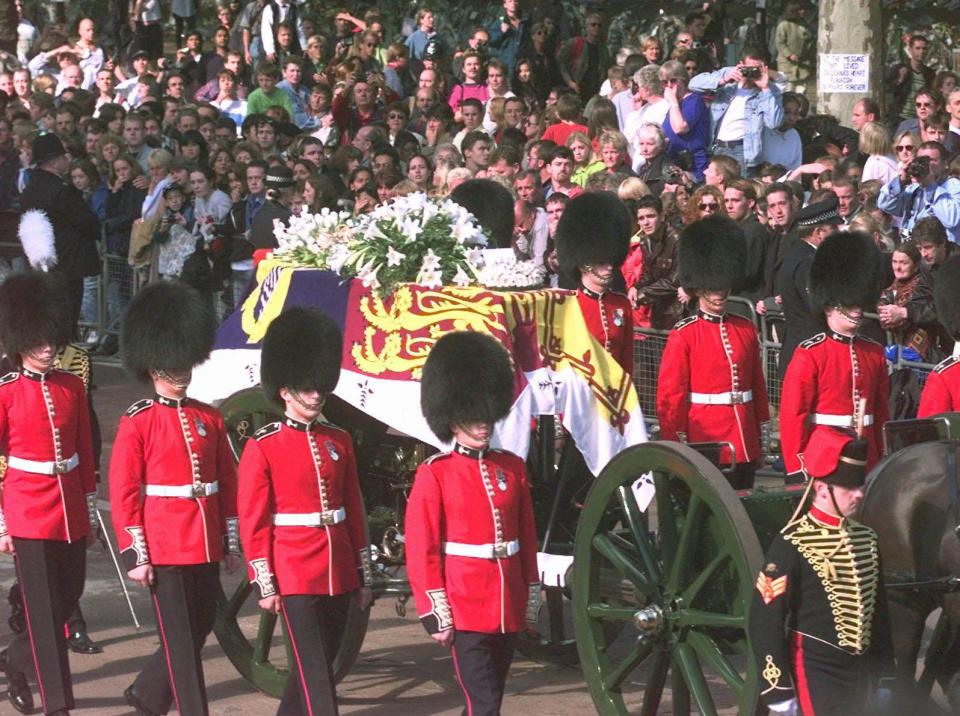  Welsh Guardsmen escort the coffin of the Princess of Wale through the streets of London