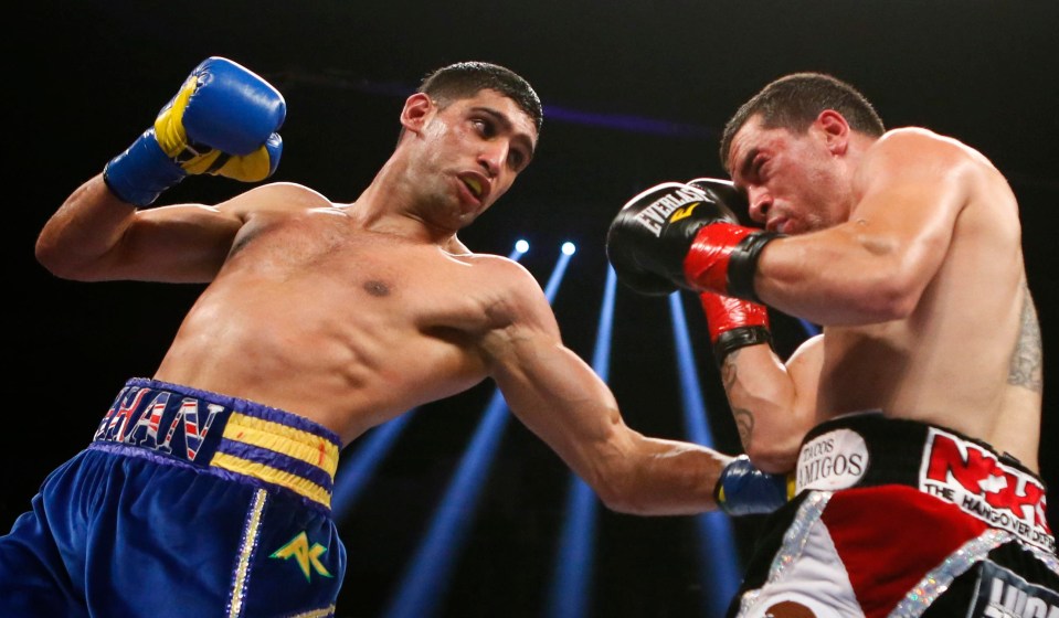 Amir Khan lands a punch on Carlos Molina. The fight, in 2012, saw him earn a reported fee of £700,000