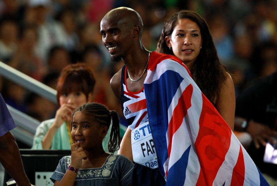 Farah celebrates with his family after taking gold in the 2011 World Championships 5,000m