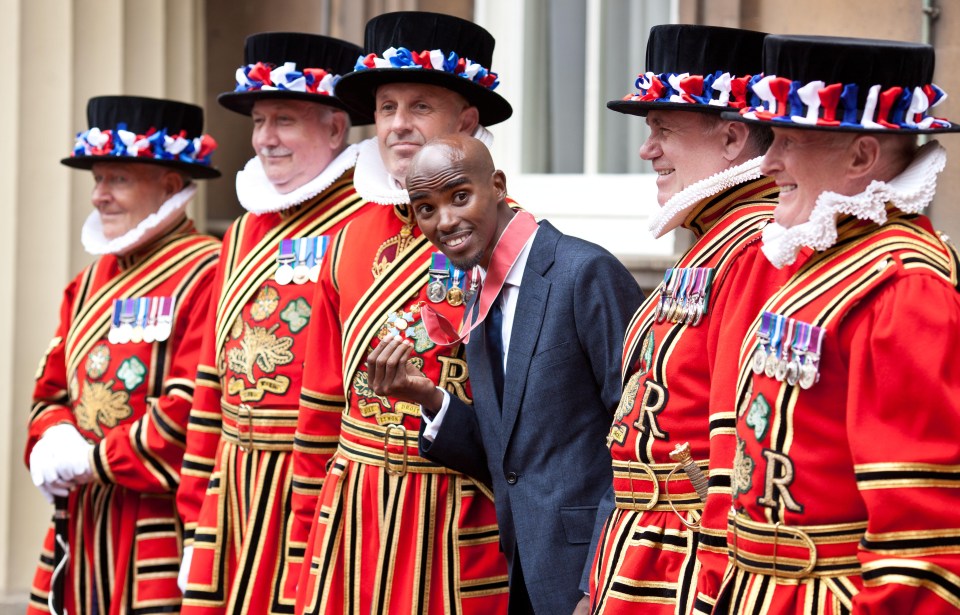 Mo Farah collecting his CBE in 2013