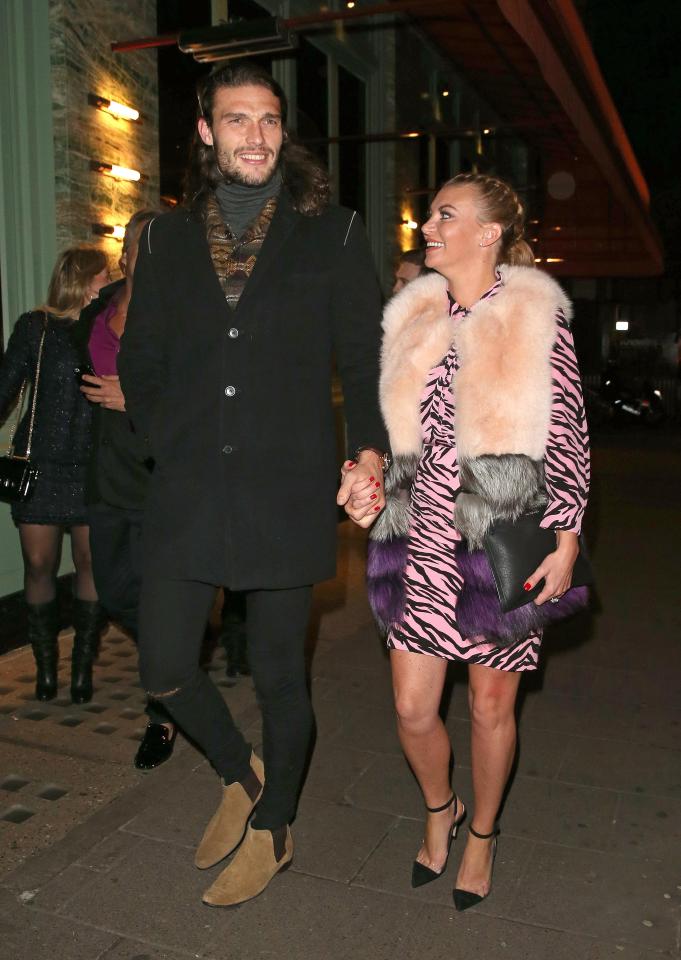  Premier League star Andy Carroll, pictured with fiancee Billi Mucklow, told a court he thought a robbery 'was a prank'