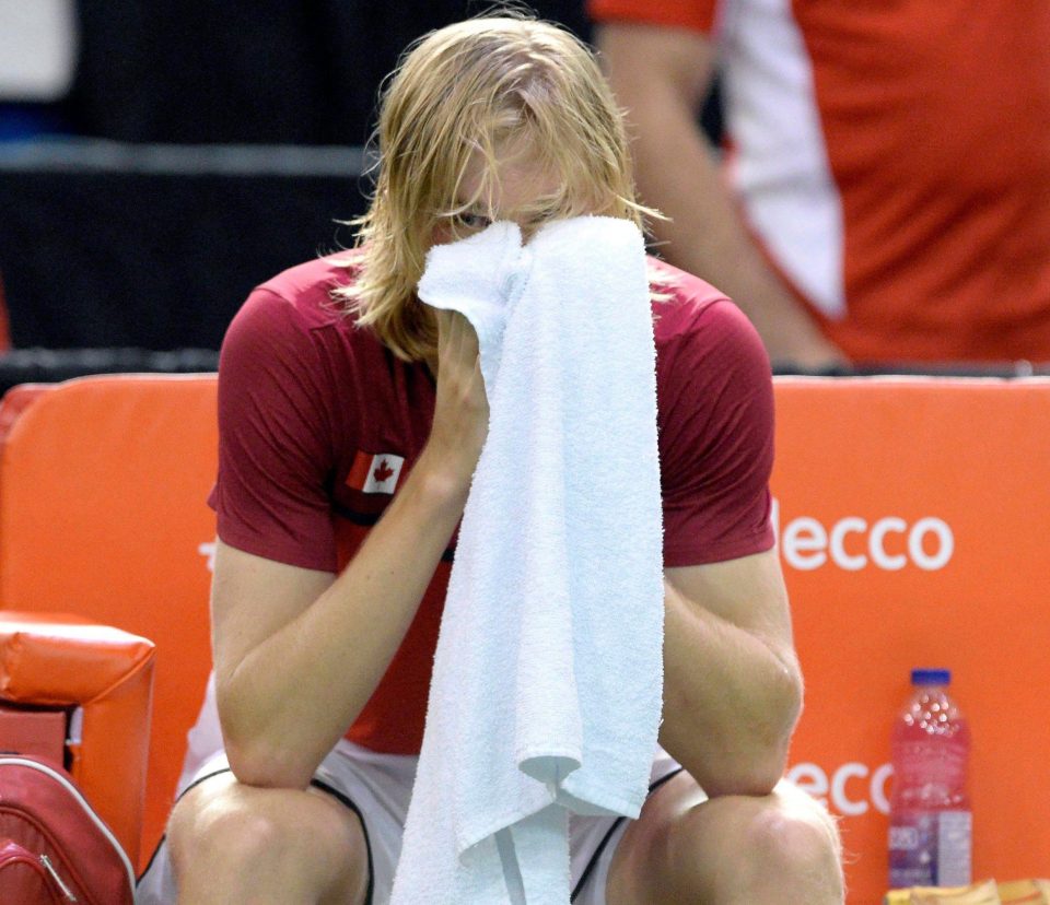  Denis Shapovalov reacts after his wild swing at a ball ended up with umpire Arnaud Gabas being hit and defaulting the Canadian player