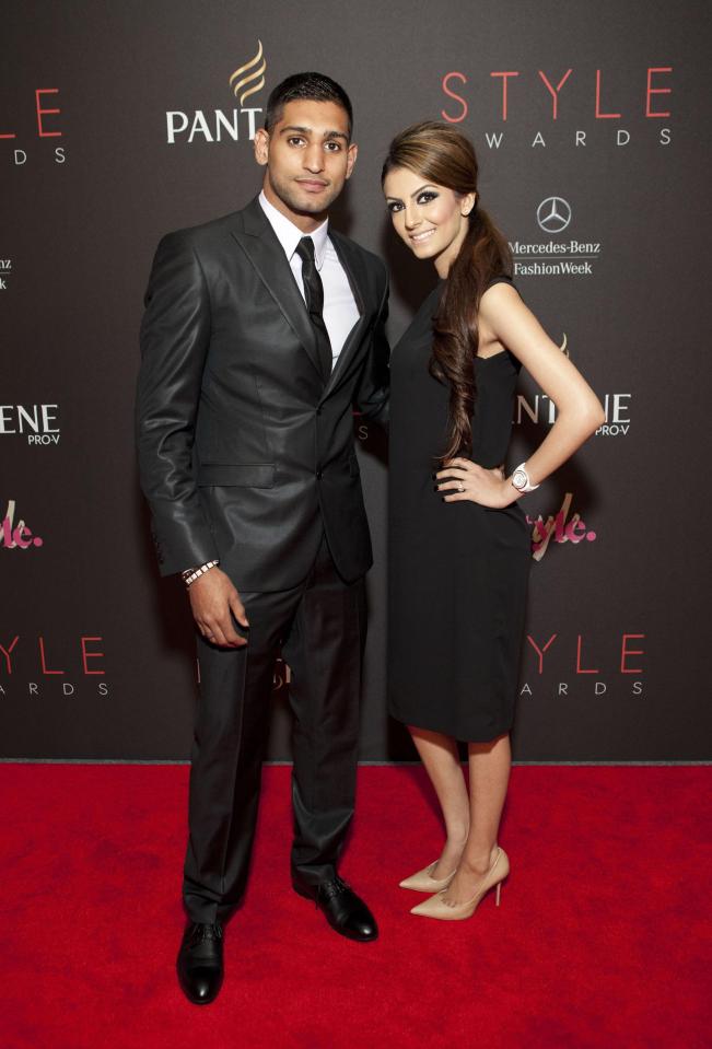  A shot from shows Faryal posing with her fella on the red carpet at the 2012 Style Awards