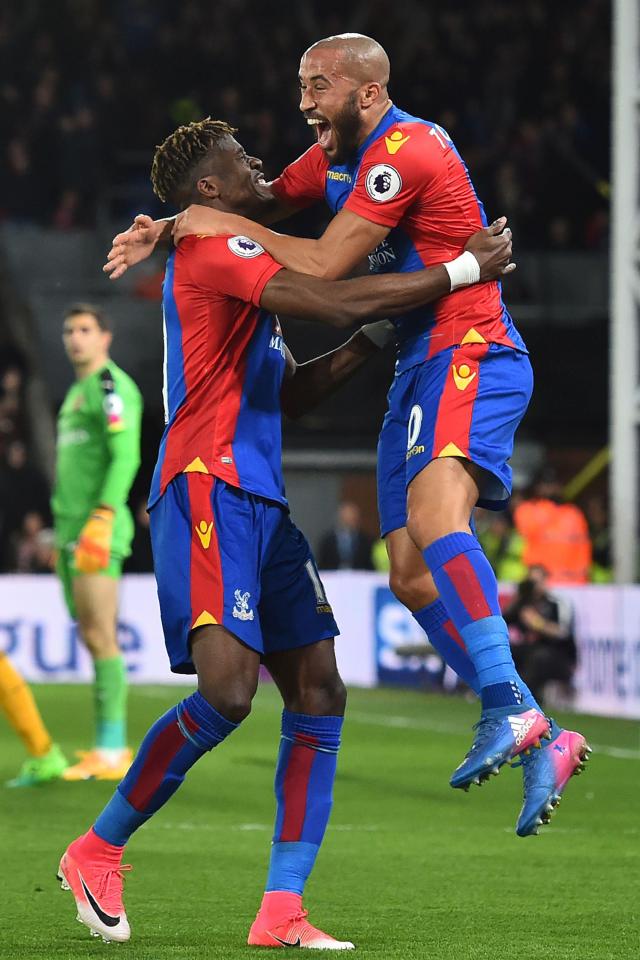 Townsend celebrates an Eagles goal with team-mate Wilfried Zaha