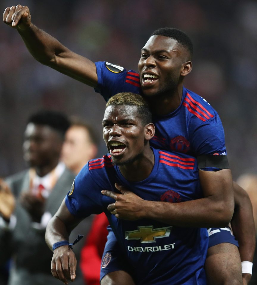 Fosu-Mensah celebrates Manchester Uniteds Europa League triumph with Paul Pogba