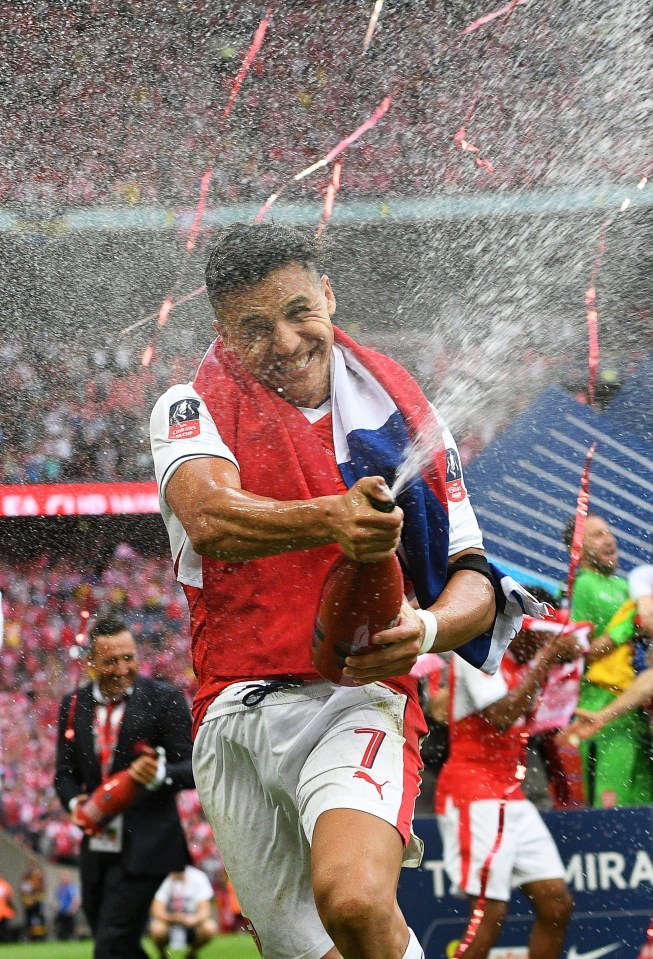 Alexis Sanchez celebrated with an FA Cup last season, their third in four years