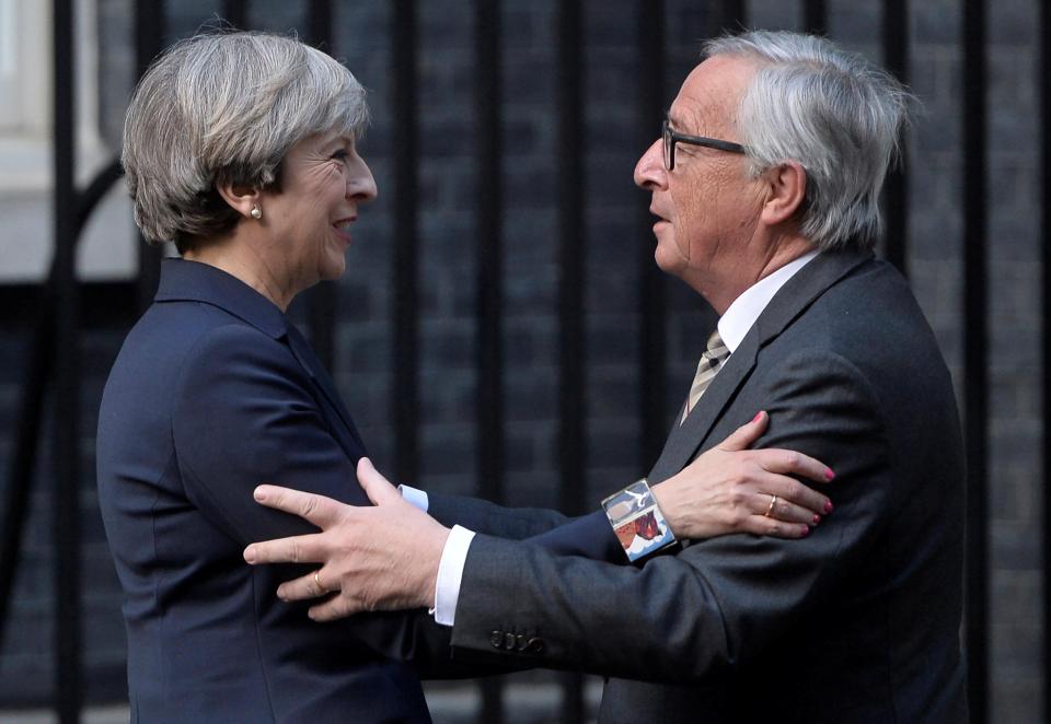  Theresa May - seen here with Jean-Claud Juncker - wants to improve efforts to 'get the message out' to the EU