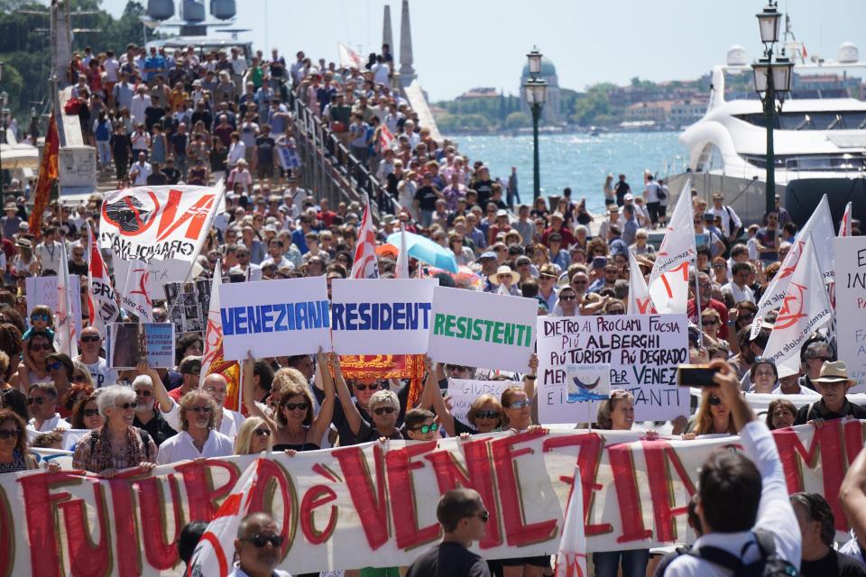 Locals in Venice protest against tourism, calling for a cap on the numbers