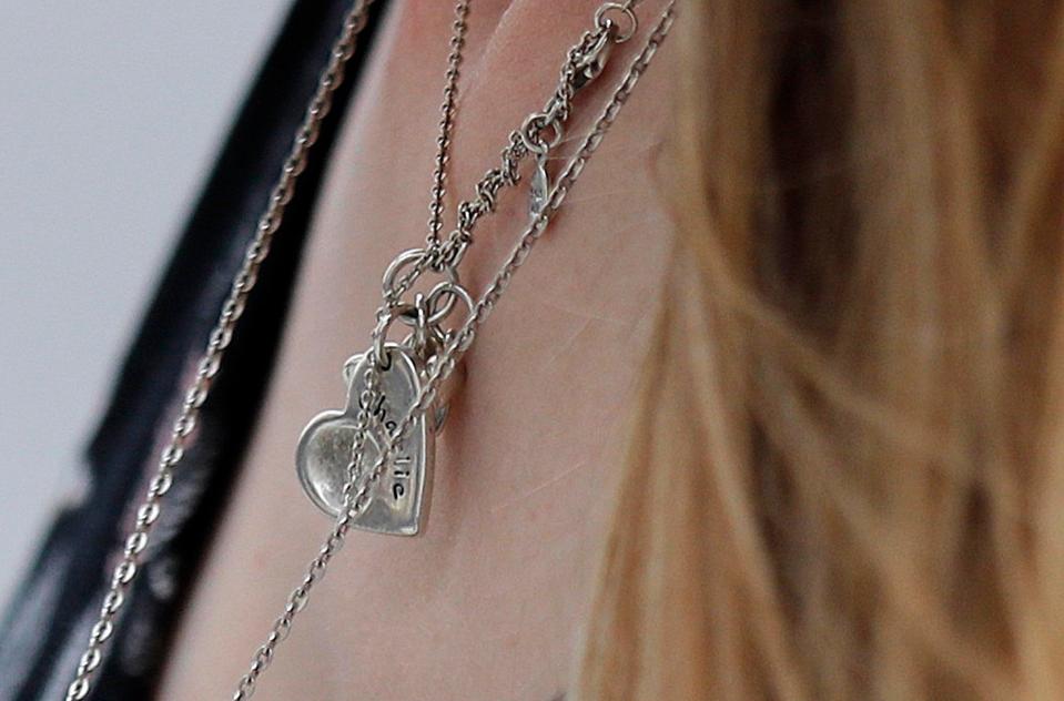  The mum, 31, wears a heart-shaped pendant in honour of her son