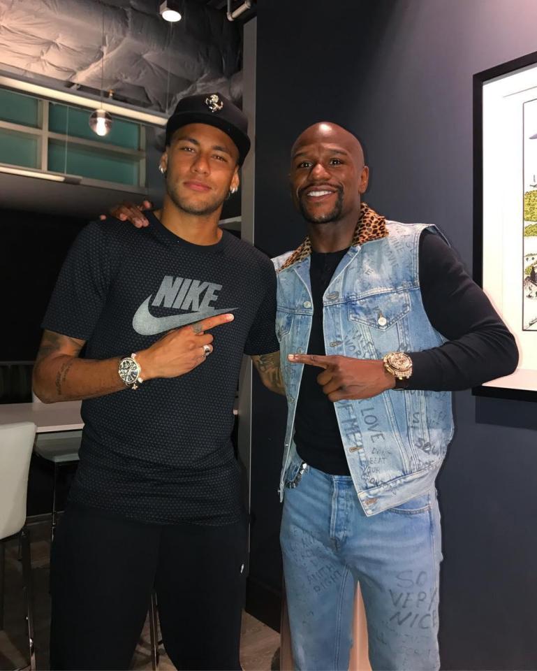 Neymar, recently pictured with boxing star Floyd Mayweather, in his Nike T-shirt