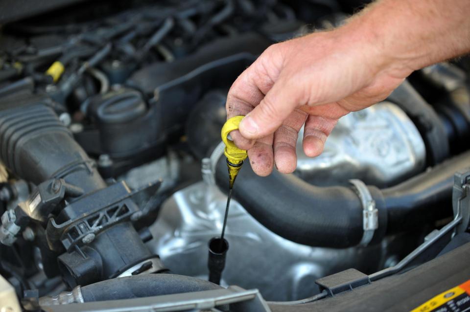 Your engine's oil dipstick shows your the amount of oil in the system