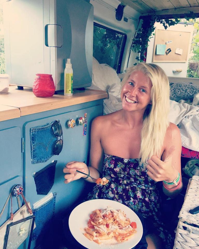  Kate enjoys a home-cooked meal inside the van during their travels