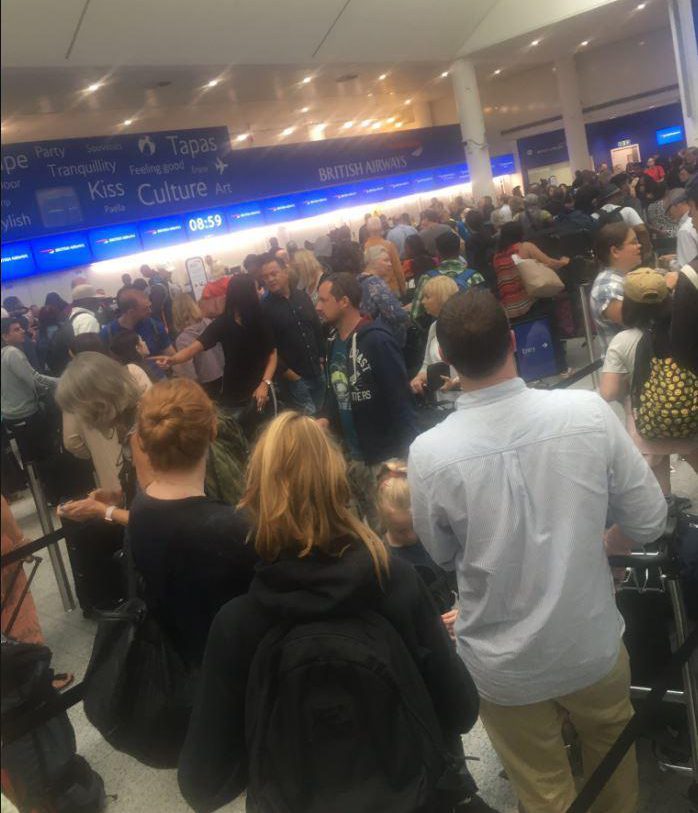  Queues eight rows deep at Gatwick airport this morning caused by a British Airways technical glitch