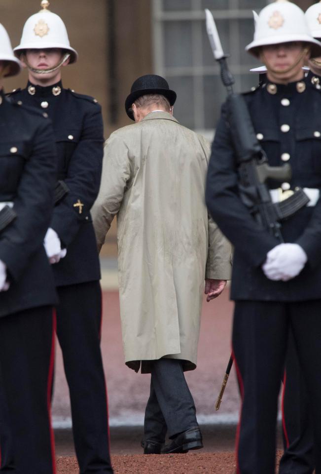  And he's off... back into the Palace and out of the rain