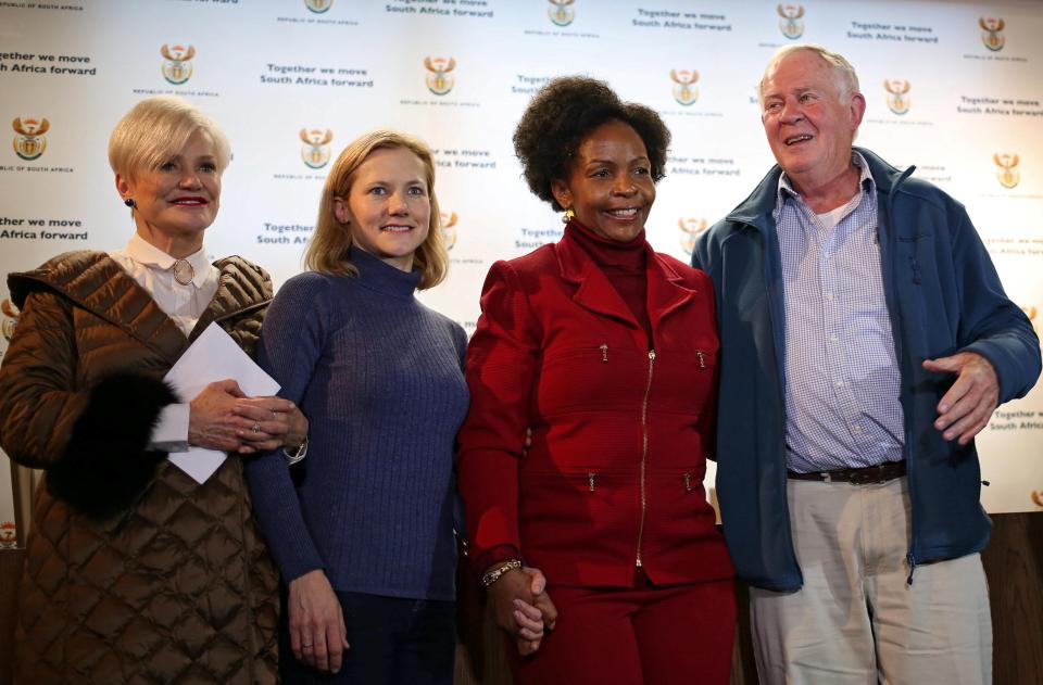  Stephen's wife Catherine McGowan, second left, with his father Malcom, right, mother-in-law Sue Peisier, left, and South African Minister, Maite Nkoana-Mashabane