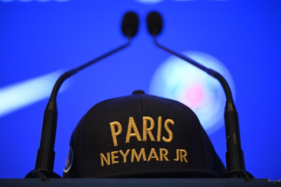 Paris Saint-Germain had set up the press conference with Neymar caps on the desk