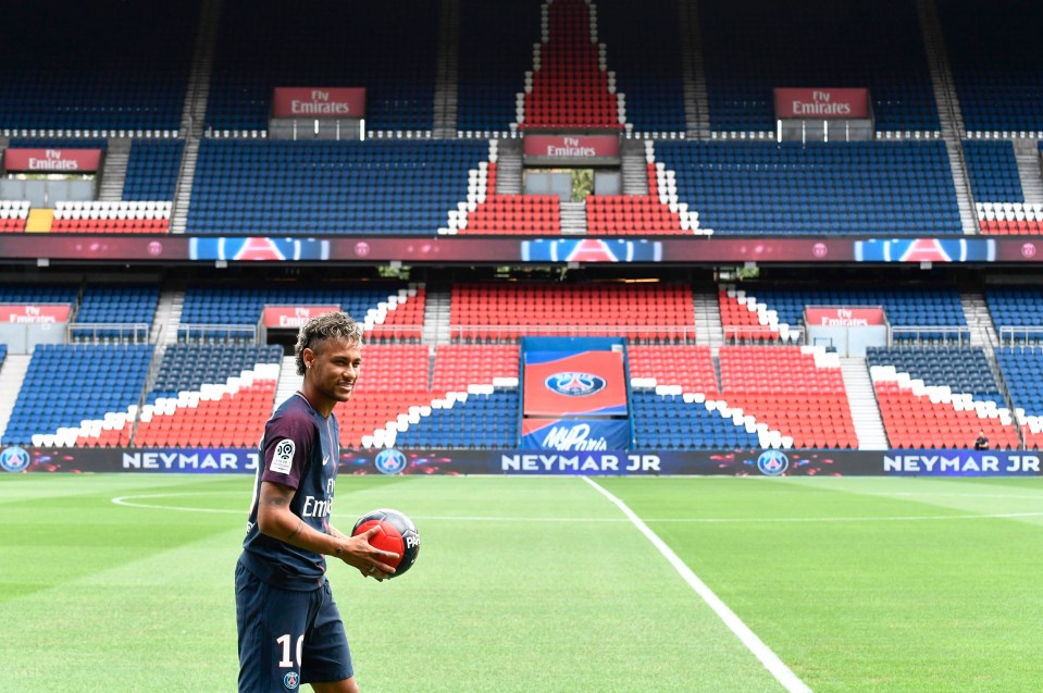 Neymar juggles the ball in front of Parc des Princes' iconic PSG logo