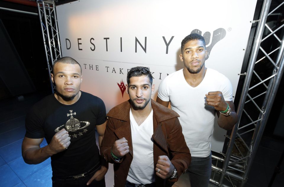  Amir Khan with Chris Eubank Jr and Anthony Joshua (centre) at a game launch in 2015