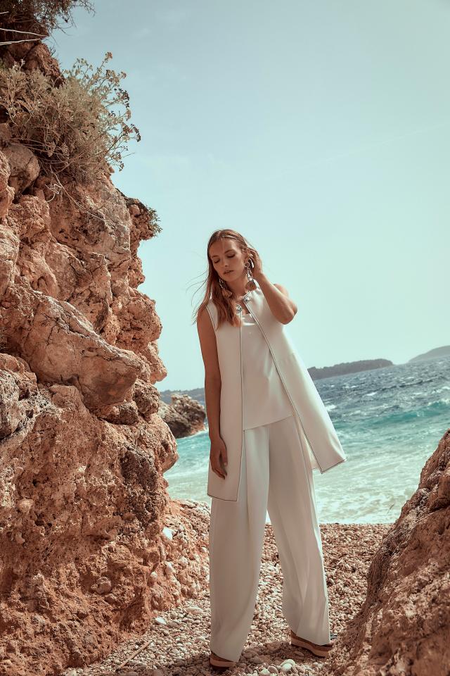  An all white suit will have you looking chic in the sun