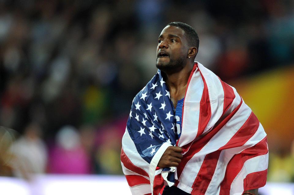 Justin Gatlin was prevented from taking a lap of honour as the crowd jeered his 100m victory