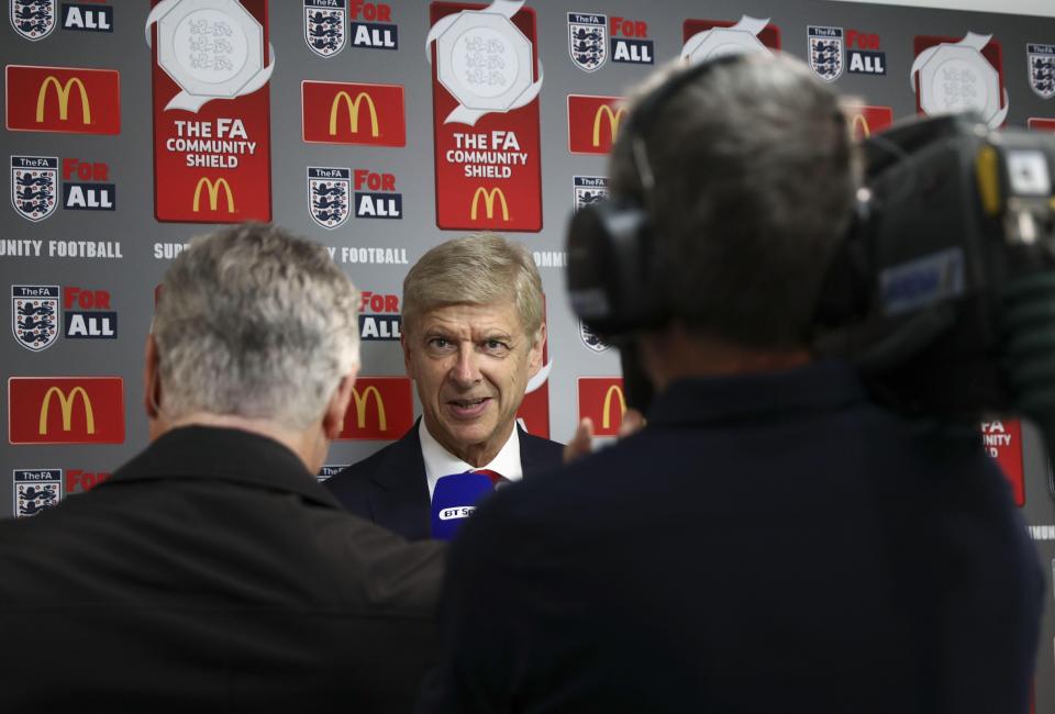  Arsene Wenger speaks to the press before sending his team out at Wembley