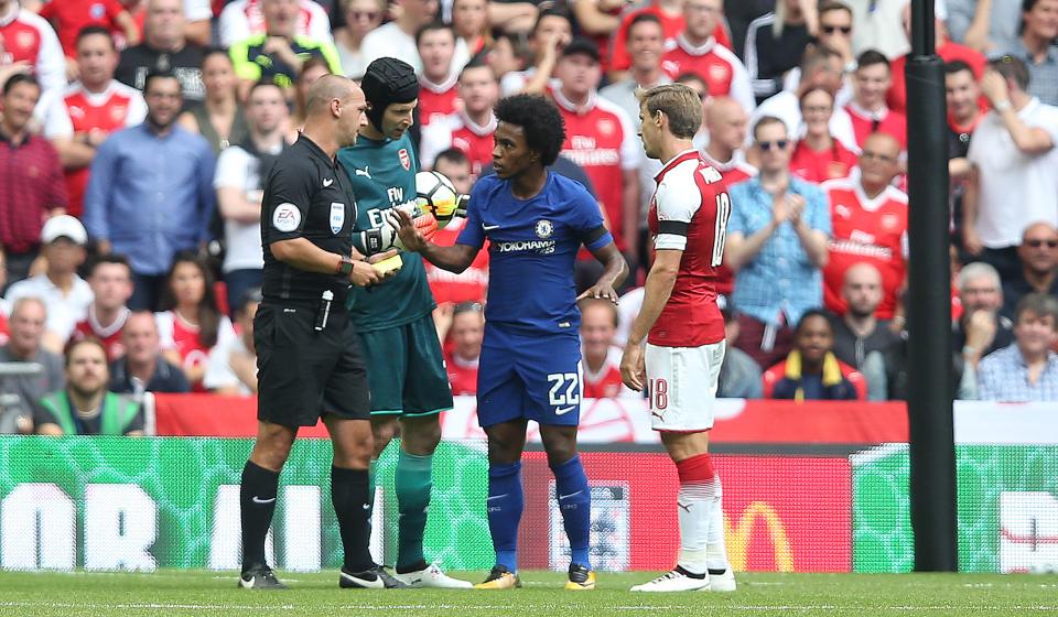 Willian was booked for diving during the first half - but appeared to trip over his own feet