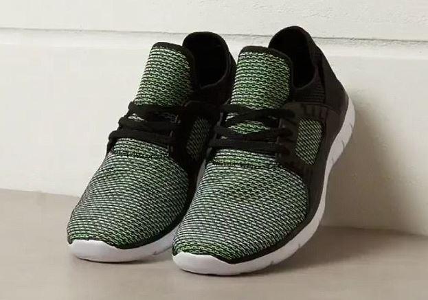  Primark has unveiled a pair of dark green two-tone trainers for men that are £14