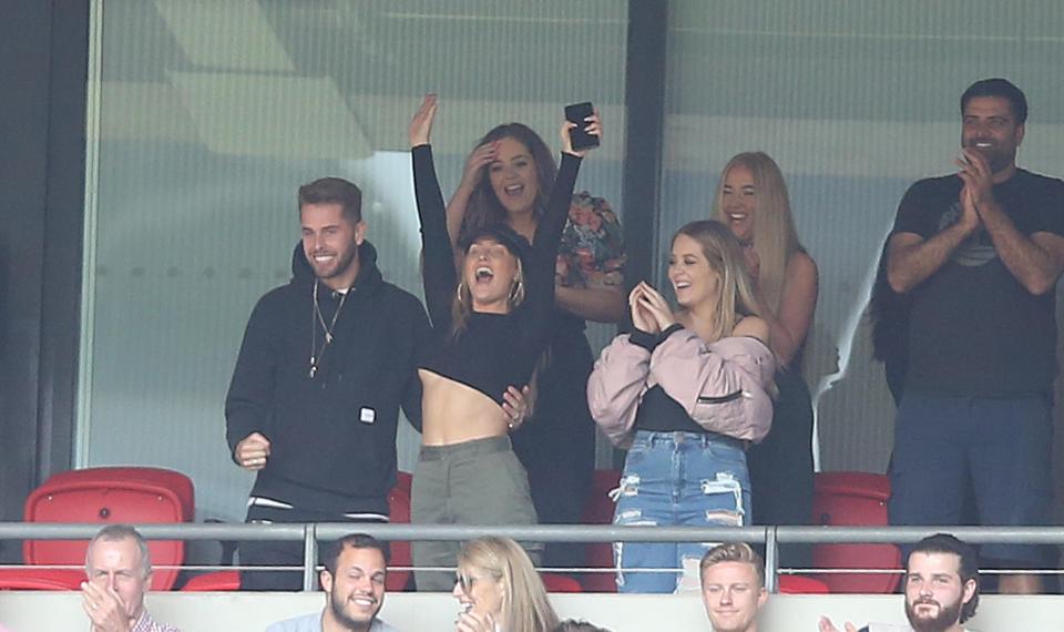  Perrie Edwards almost burst out of her top while watching her man Alex Oxlade-Chamberlain play in the FA Community Shield