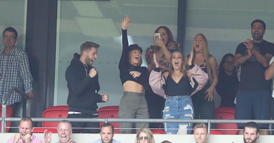  She celebrated with friends as Alex scored a penalty in the shoot-out