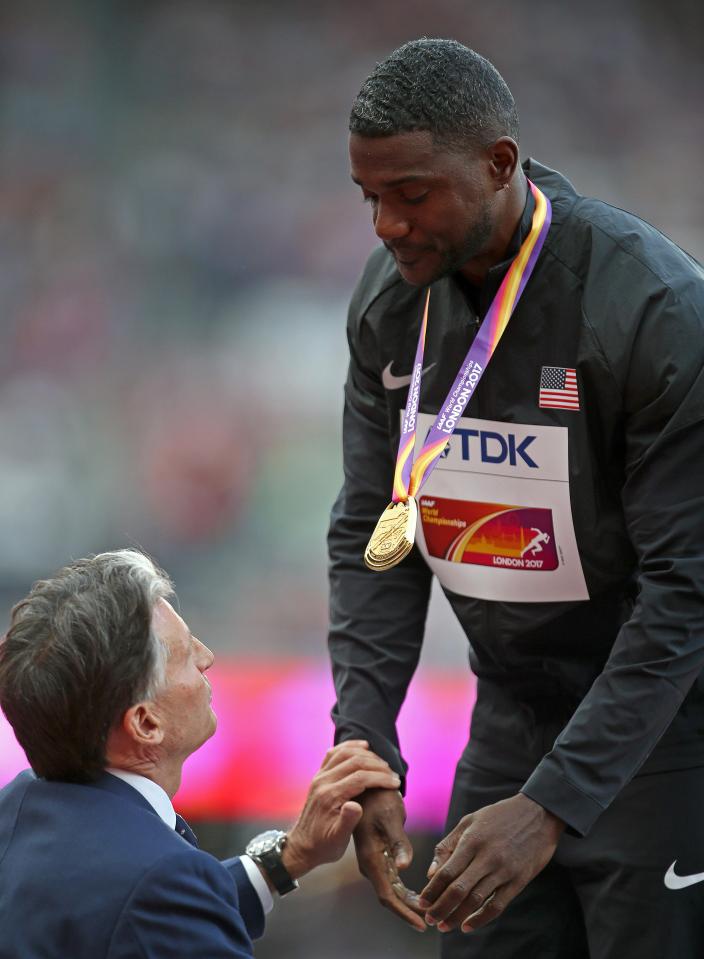 IAAF president Lord Coe, an outspoken doping critic, presnted Gatlin with his medal