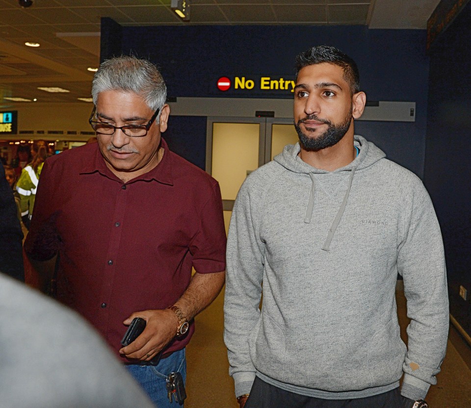 Amir was spotted at the airport with his dad Shah