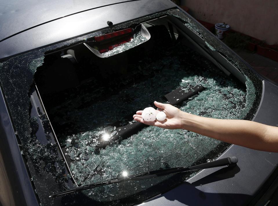 A car windscreen smashed by the hailstones in Spain