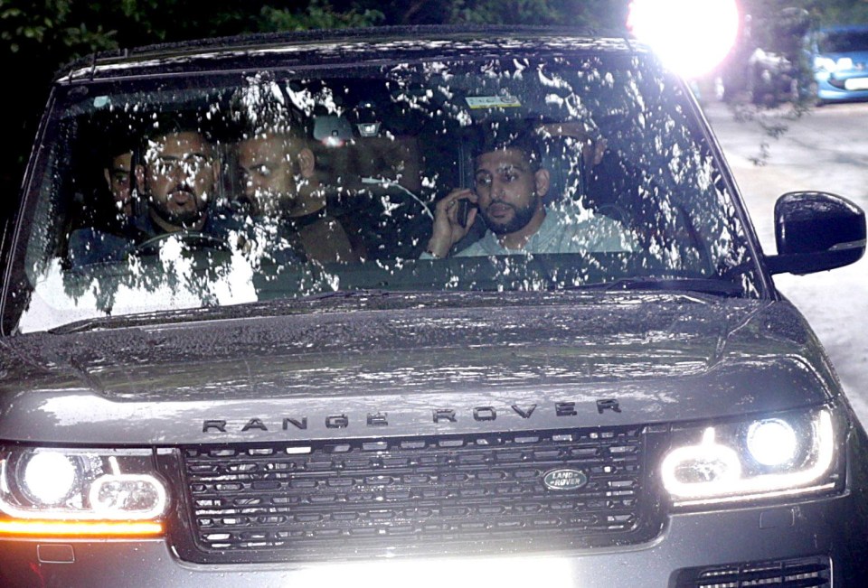 The star was in the front passenger seat of a silver Range Rover yesterday as he arrived back from Dubai