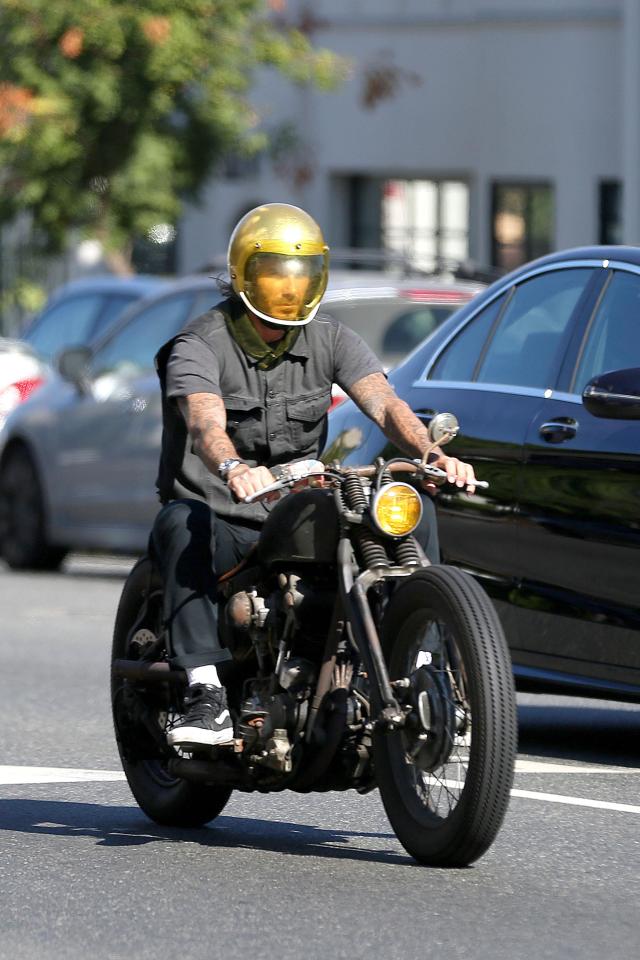  The dad enjoyed a casual ride on the motorbike