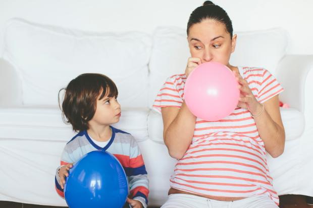 Travelling parents swear by the humble balloon for keeping kids occupied on the cheap