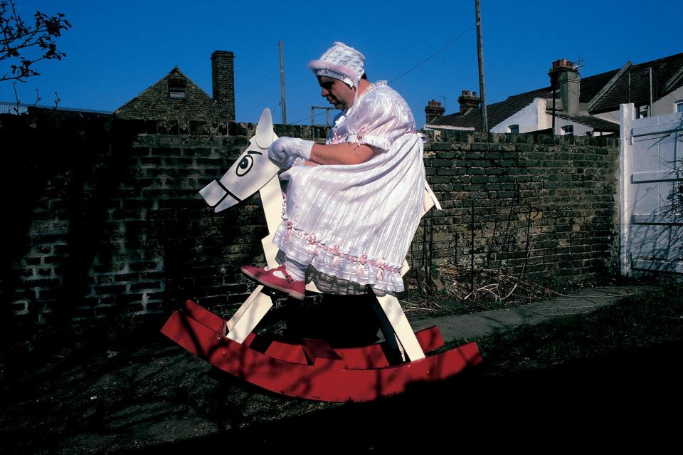  An 'infantalist' is seen playing on a rocking horse in one of the snaps