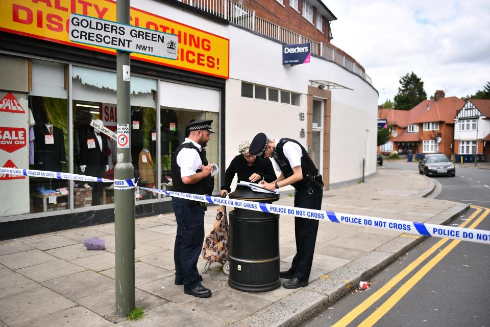  Detectives at the cordon at Golders Green Crescent in North London, where Hannah and Louise Cohen were found dead