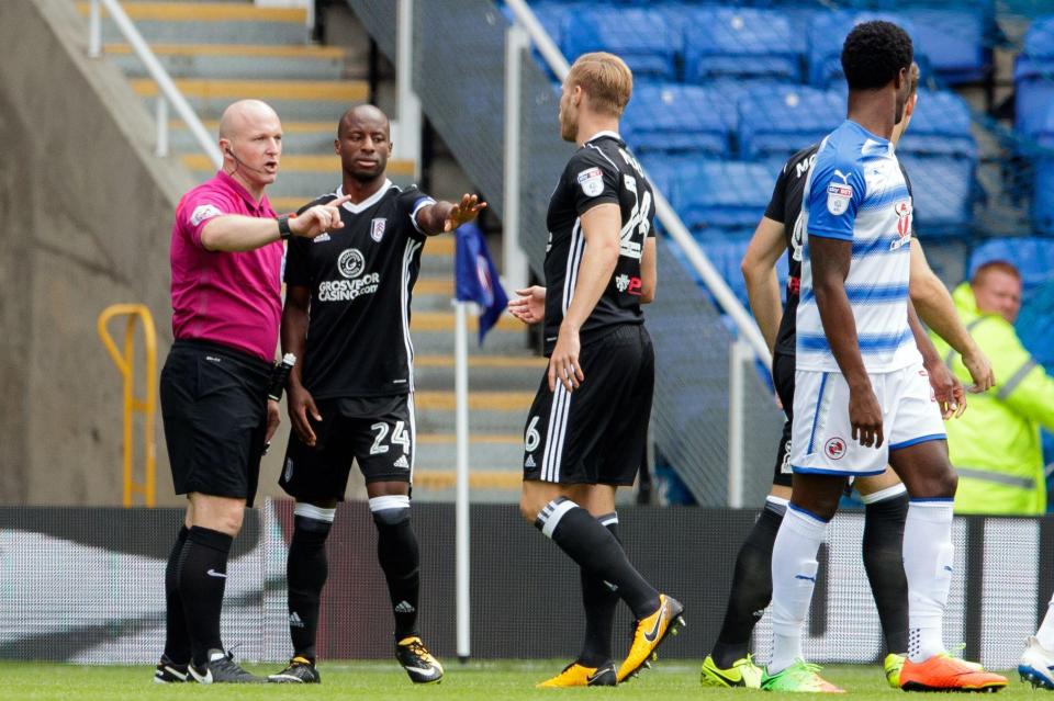 Referee Simon Hooper searches out Tomas Kalas to show him the red card