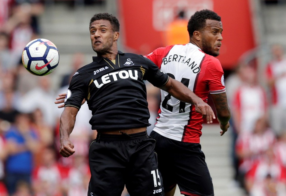 Wayne Routledge in action with Ryan Bertrand