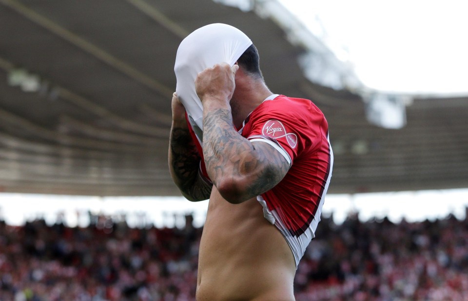 Charlie Austin looks dejected after missing a chance to score for the Saints