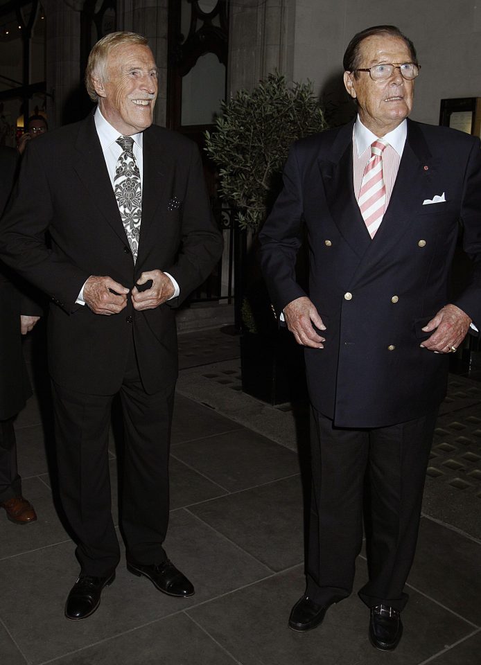  Bruce with James Bond star Sir Roger Moore - who died earlier this year - outside Scott's Restaurant, London in 2012