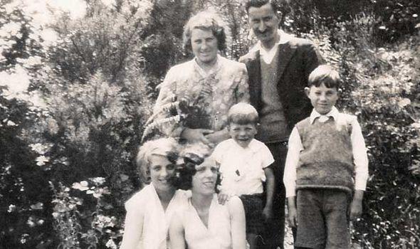  Bruce, aged five (middle) with mum Florence, dad John, brother John and sister Maisie (centre) with a friend in Southend dated 1933