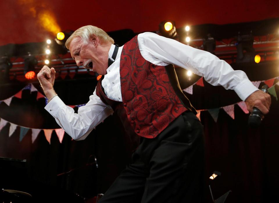  Sir Bruce busting out his iconic pose during his Glastonbury performance in 2013