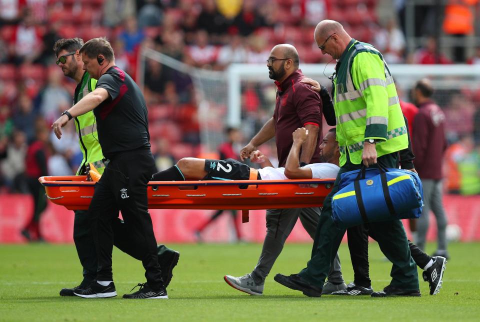 Winston Reid is carried off on a stretcher in the warm-up to end his hopes of facing Southampton