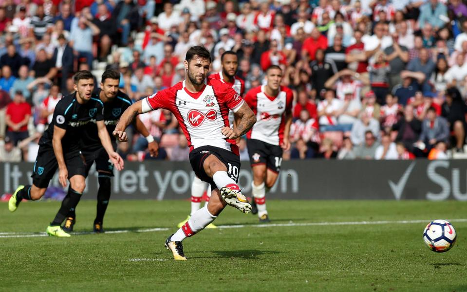 Charlie Austin converts from the spot to snatch a stoppage time victory for Southampton over West Ham