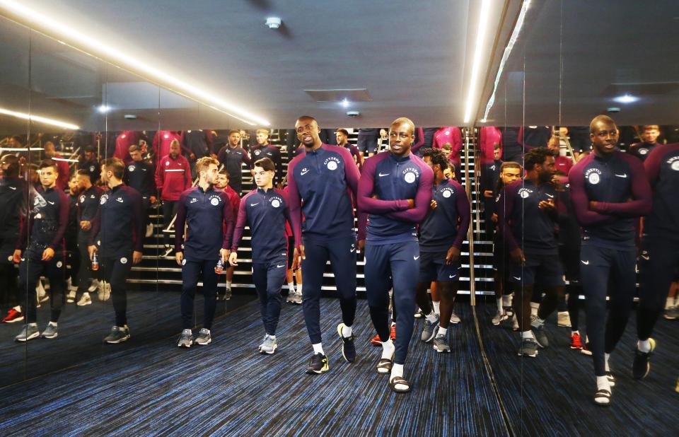 The squad take a leisurely stroll down their new tunnel ahead of the Everton fixture