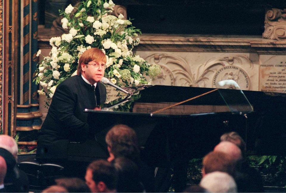  Elton John performs Candle in the Wind for Princess Diana at her funeral in 1997