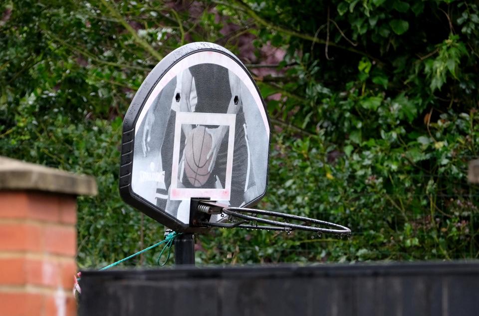  A basketball hoop in the back garden pays apparent homage to Kim's love of the US sport