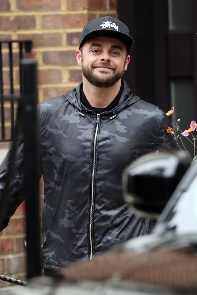  Ant McPartlin flashed a smile as he left his home yesterday