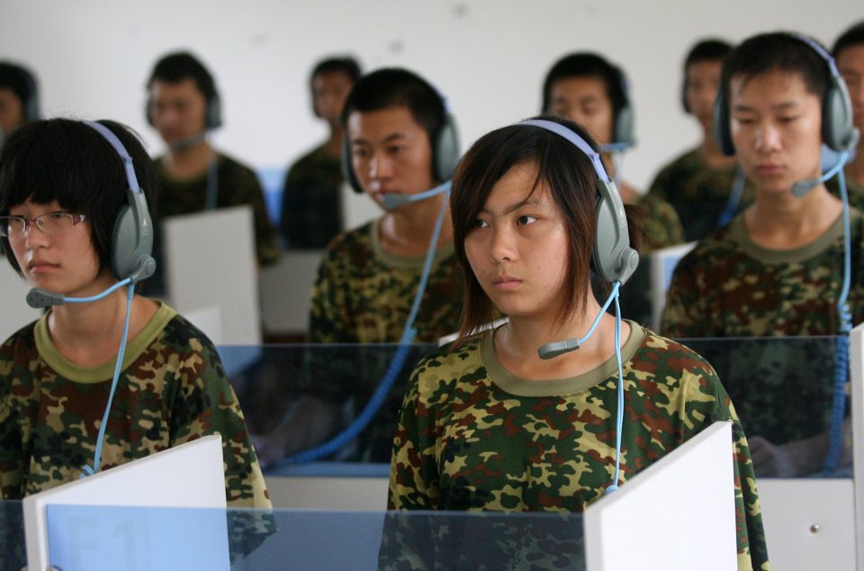  At a camp in Jinan, Shandong Province, teenagers are forced to listen to music to kick their internet habit